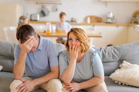 Couple sitting in silence contemplating separation